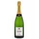 Bottiglia di Champagne LAËTITIA TORCHET Brut Tradition in servizio.