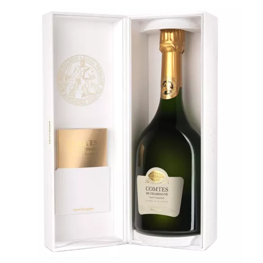 Bottiglia di Champagne Taittinger Comtes de Champagne 2013, vista frontale, etichetta bianca e tappo dorato