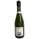 Bottiglia di Champagne R.Faivre Les Reflets du Clocher Extra Brut, etichetta bianco-nera, 750 ml.