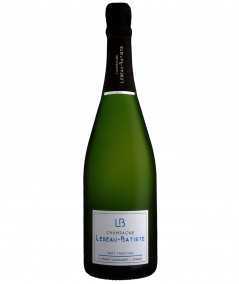 Champagne LEBEAU-BATISTE Brut Tradition - Elegante bottiglia di champagne frizzante in un ambiente raffinato.